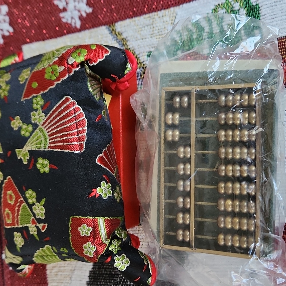 VINTAGE MID 20TH CENTURY CHINESE MINIATURE BRASS ABACUS MOUNTED ON GREEN MARBLE.